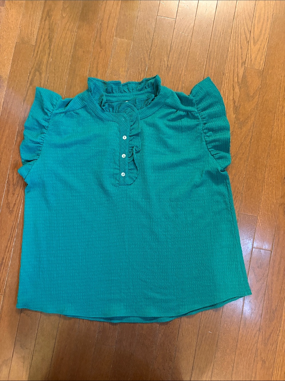 Women’s emerald green Ruffle Sleeve Blouse sleeveless